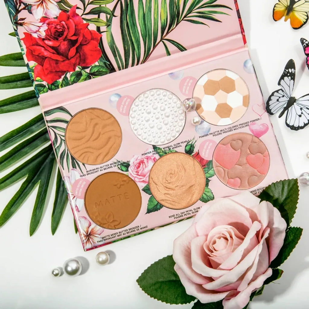 Physicians Formula All-Star Face Palette featuring six powders with floral and heart embossing, displayed with roses and pearls