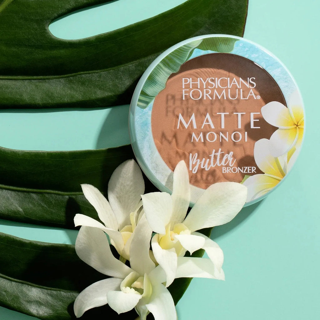 Physicians Formula Matte Monoi Butter Bronzer compact with floral design and tropical background