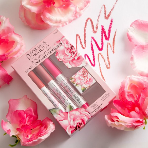 Rose Kiss all Day Lip Kit Set in product packaging on floral and white background