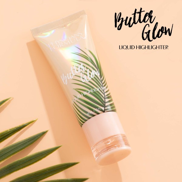 1712791 Butter Glow Liquid Highlighter | front product view with peach background and palm details | image text: Butter Glow Liquid Bronzer