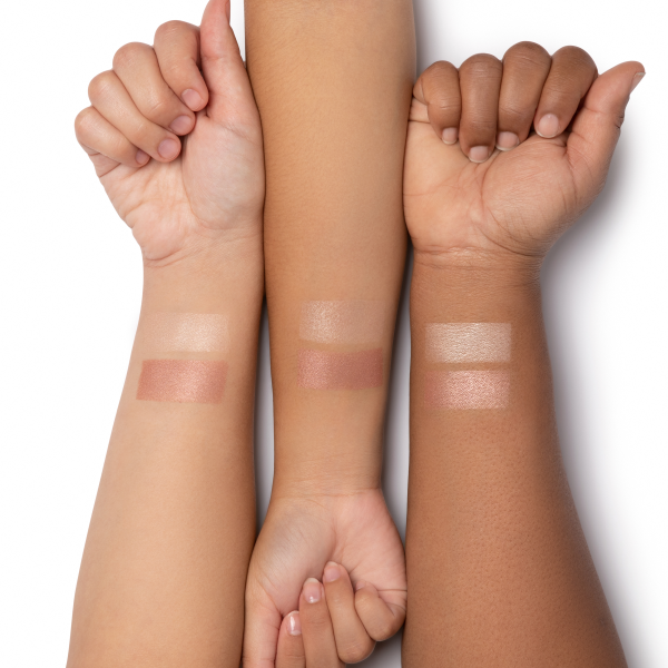 1712795 Butter Glow Pressed Powders | pressed powder arm swatches in shades Translucent Glow and Natural Glow on 3 skin tones on white background