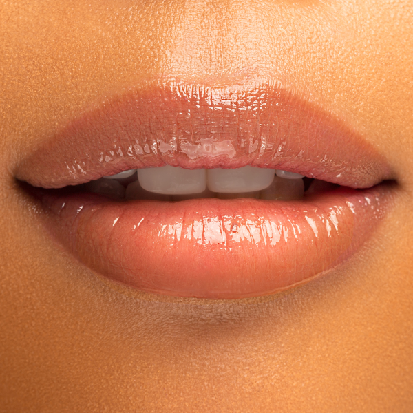 1712802 Mineral Wear Diamond Gloss | model wearing gloss, closeup of lips