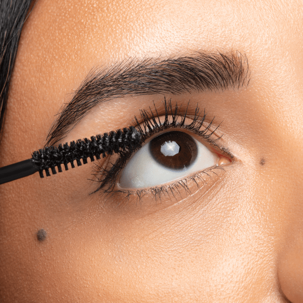 1712804 Eye Booster Lash Illusion | model closeup of mascara on eye