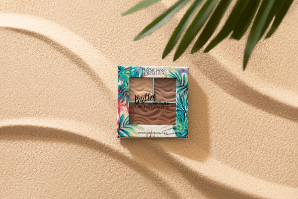 Butter Bronzer Contour Palette on nude background with palm leaves