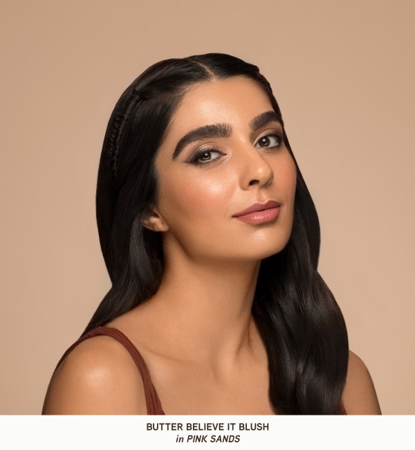 Butter Believe It! Blush Model face closeup on tan background