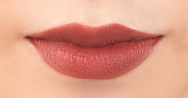 Organic Wear Nourishing Lipstick Model, closeup of lips in shade Spice